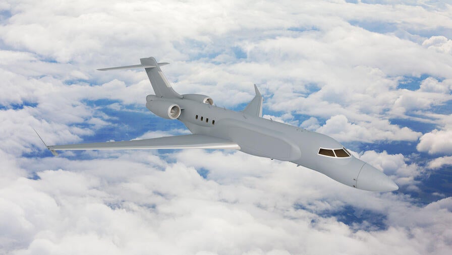 L3Harris' concept graphic of the right side, forward view of the AERIS X Bombardier Global 6500 Variant in flight with sky and cloud background