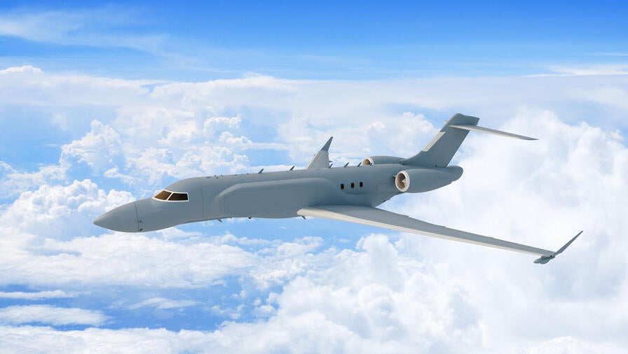 L3Harris' concept graphic of the left side, forward view of the AERIS X Bombardier Global 6500 Variant in flight with sky and cloud background