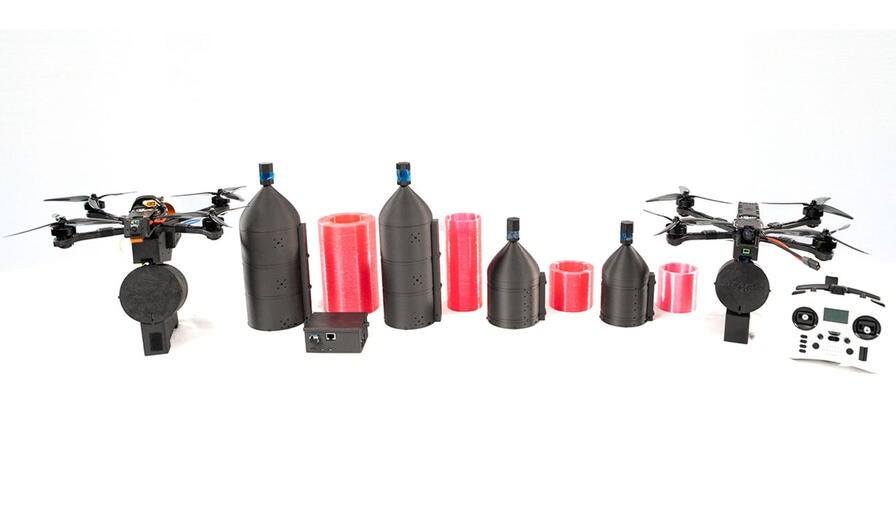 Drone Fiber Optic Tether (DFT) Pack Line-up (left to right: 20, 12, 5, 2 km) Outside Shells with Digital Fly-by-Fiber System (DFFS) (far left) and Analog Fly-by-Fiber System (AFFS) (far right)​