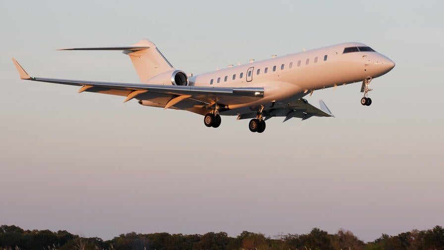 ARES aircraft in flight at dusk
